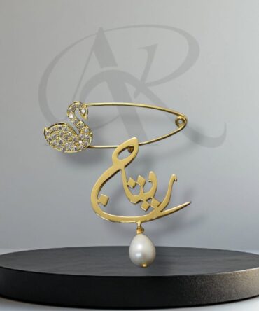 Name brooch with a crystal duck