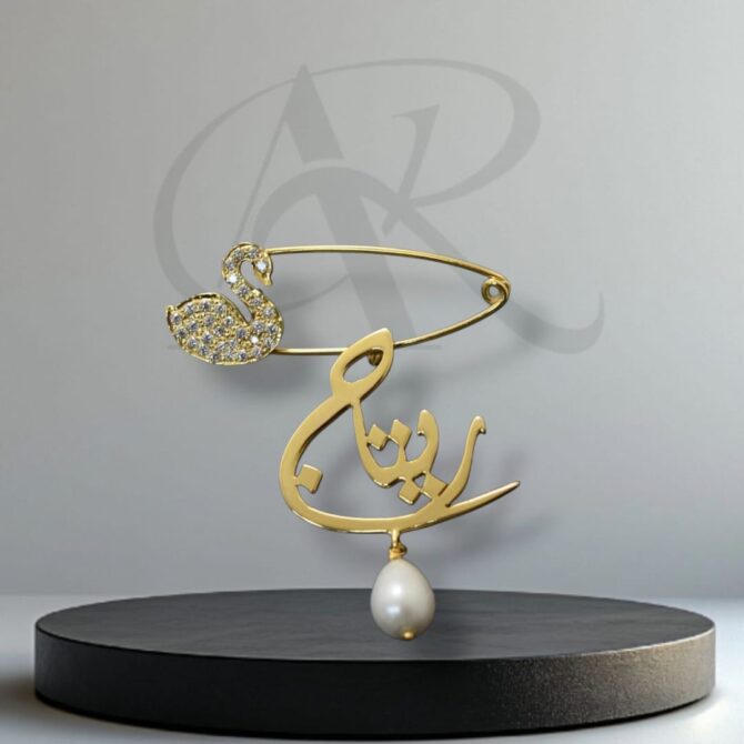 Name brooch with a crystal duck